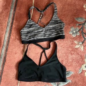 Under armour sports bra 2 pack black and black stripped size medium